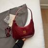 Bolsa Dumpling de Couro Envernizado da Moda para Carregar na Mão para Mulheres 2025 Novo Estilo Início do Outono Bolsa de Axila Simples e Versátil Bolsa Feminina High-End de Ombro Único