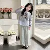 Sudadera casual de manga larga estilo coreano para chicas 2026, pantalones anchos a cuadros holgados, conjunto de dos piezas único y moderno