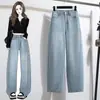Toma real de jeans ajustadores de color claro con curvas para mujer, talla grande, diseño nuevo, pantalones tipo guadaña de corte holgado, pantalones de pierna ancha hasta el suelo