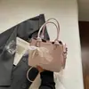 Bolsa de Balde Portátil de Grande Capacidade de Nicho Transfronteiriça Feminina Verão 2026 Nova Bolsa Tote Tecida de Cor Sólida Ombro Único Transversal