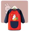 Delantales infantiles hechos a medida con diseños impresos, impermeables y resistentes a las manchas, de manga larga, reversibles, adecuados para preescolar y la hora de comer del bebé, protegiendo la ropa