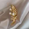 Broches de aleación de nuevo estilo para mujer al por mayor, pasadores versátiles para abrigos y trajes