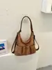 Bolsa de mano versátil para el día a día, gran capacidad, bolsa para mujer más vendida, mochila de moda nueva, bolso de hombro de nicho, bolso cruzado