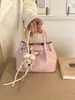 Bolso de Mano con Colgante Estilo Coreano para Mujer 2026 Nuevo Versátil Bolso de Hombro Cruzado de PU Bolso Cubo Simple de Moda