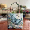 Bolso nuevo de estilo étnico, con tela color arena y bordado, un diseño fresco y casual, con bordado de hilo dorado a doble cara, una bolsa pequeña de tela y una bolsa estilo Hanfu