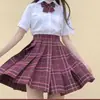 Uniforme jk falda otoño básico conjunto completo de falda a cuadros camisa manga corta corbata de lazo conjunto completo de estilo universitario japonés
