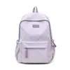 Mochila escolar de estilo nicho moderno para estudiantes de preparatoria, alto valor estético, color sólido, gran capacidad, mochila ligera para niñas de secundaria.
