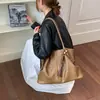 Bolso Tote Retro de Gran Capacidad para Debajo del Brazo para Mujer 2026 Otoño Nuevo Bolso de Hombro Pequeño de Nicho Simple Bolso de Mano para el Trabajo