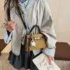 Bolsas Retro de Gamuza de Nicho Otoño e Invierno 2026 Nueva Moda Bolso Cruzado Versátil Bolso de Hombro Único Bolso Kelly