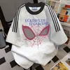 Camiseta Unisex de Manga Corta con Estampado de Letras de Marca de Moda, Patchwork de Tres Rayas, Top Holgado Casual Versátil de Verano Ins