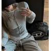 Design de Peça Dupla para Férias de Outono e Inverno Camiseta de Manga Longa com Ombro Direito Estilo Americano para Mulheres com Camisa Básica que Pode Ser Usada por Fora Tops Ajustados ao Corpo