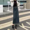 Mercadorias europeias Saia jeans feminina 2025 nova primavera e outono cintura alta quadril A saia longa fenda Joker justa