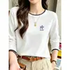 Camiseta de algodão puro com gola redonda e mangas compridas, estilo two-piece falso, para mulheres, top branco moderno e versátil para o outono, novo modelo 2026