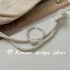 Anillo Minimalista Inspirado en el Estilo Coreano de Plata Esterlina S925 con Nudo Trenzado en Forma de Cuerno, con un Acabado de Alta Gama para Mujer, Adecuado para Apilar