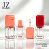 Pedido em estoque: Frasco quadrado, tampa irregular, tubo de glaze labial, tubo de gloss labial, material de embalagem de tubo plástico vazio