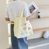 Nueva Bolsa Tote de Dibujos Animados Bordada con Cordón Ajustable de Hombro Único Estilo Casual para Mujer de Gran Capacidad para Traslado Diario