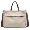 Bolsa de Ombro 2025 Primavera Novo Estilo Simples e Fashion Tote Bag para Mulheres Transversal Grande Capacidade Portátil Tendência Tote Bag