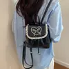 Mochila de renda com laço transfronteiriça de nicho para mulheres, nova moda 2026, bolsa de mão de viagem de alta qualidade