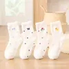 Meias quentes e grossas de lã australiana para outono e inverno, com estampas de desenhos animados, comprimento médio até a panturrilha, material felpudo, na cor branco leitoso, adequadas para mulheres e podem ser usadas como meias de dormir