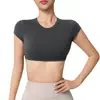 Camiseta Deportiva de Manga Corta Wangtu Ombliguera para Yoga con Almohadilla en el Pecho Fitness Running Deportes Fábrica de Comercio Exterior Se puede imprimir