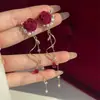 Pendientes de Borlas con Lazo Rojo 2026 Nuevo Estilo Caliente Lujo Ligero Gama Alta Pendientes de Año Nuevo Accesorios de Oreja Únicos de Nicho