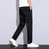 Loja de outlet de comércio exterior calças casuais cropped masculinas primavera-verão para pessoas de baixa estatura, calças retas slim fit ligeiramente afuniladas, calças longas finas, calças masculinas de 9 pontos