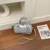 Bolsa de bolos para mujer, nuevo estilo coreano de moda primavera 2026, bolso de mano de alta gama versátil para el hombro y cruzado para el trabajo