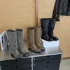 Hebilla de cinturón para mujer de nicho coreano botas de caballero primavera/verano 2026 nuevo vintage versátil plegable plisadas largas botas de motociclista