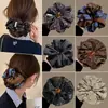 Novo scrunchie de alta qualidade para rabo de cavalo baixo 2026 para mulheres, apresentando um estilo inspirado em Melard, um acessório de cabelo retrô para outono e inverno