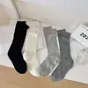 Calcetines de verano para mujer, finos, apilables, de algodón, de color liso, de longitud media, a rayas, de malla hueca, populares en ciberseguridad para primavera y otoño.
