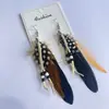 Pendientes de Plumas Coloridos Bohemios Transfronterizos Carnaval Europeo y Americano Navidad Diseño de Nicho Pendientes de Borla de Cuentas de Semilla para Mujer