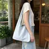 Bolso de hombro vertical a rayas ins nuevo diseño de nicho para mujer, bolsa tipo chaleco, gran capacidad, ligero, para ir al trabajo, compras, bolsa de mano