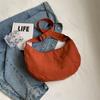 Bolsa tiracolo feminina grande capacidade estudante casual bolsa de ombro bolsa esportiva primavera e verão nova bolsa bolinho japonês atacado