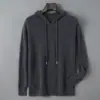Sudadera con capucha de lana pura para hombre, sudadera con capucha de corte holgado, suéter de punto, nuevo top versátil suave de manga larga casual para otoño e invierno