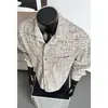 Camisa de veludo cotelê de manga comprida com estampa xadrez tie-dye estilo americano, coleção Primavera/Outono 2026, uma camisa masculina estilosa e moderna com modelagem relaxada