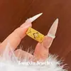 Nuevo anillo de trébol de encaje estilo chino Buccellati para mujer, con una elegancia de estilo nacional, lujo ligero de nicho y una sensación de alta gama, con un diseño abierto