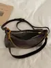 Bolso de axila tipo dumpling retro de nicho estilo coreano para mujer, nuevo bolso cruzado de alto valor 2026, bolso de hombro casual para el día a día