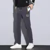 Pantalones casuales de hombre de moda china, nuevos para primavera y verano 2023, pantalones largos elásticos de cintura, bordados, versátiles, para hombre