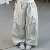 Pantalones casuales de estilo americano de secado rápido y pierna ancha para hombres y mujeres, pantalones de verano ligeros con retazos y bolsillos grandes, adecuados para bailar jazz y actividades de paracaidismo