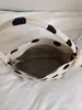 Bolso de mujer de moda de lunares de nicho estilo coreano 2026 nuevo bolso de hombro para el verano bolso de cubo pequeño elegante
