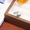 Anillo de Trébol de Cuatro Hojas Cruzado Estilo Coreano Exclusivo Diseño de Lujo Ligero de Nicho Anillo de Gama Alta Mariposa Hoja Venta al por Mayor Europea y Americana