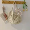 Bolsa de Palha Trançada Vazada para Mulheres 2026 Novo Estilo Primavera Bolsa de Ombro Tipo Saco de Luxo Estilo Resort na Praia Bolsa de Praia