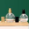 Botella de perfume redonda con forma de bayoneta, 30 ml y 50 ml, con pulverizador de vidrio, para agua cosmética, venta al por mayor