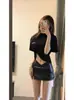 Falda bodycon negra talla grande para mujeres de talla grande, falda corta de cuero con abertura, falda corta para mujer, falda bodycon de cintura alta para otoño e invierno, falda de cuero PU, falda de longitud media