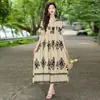 Início do verão de 2026 viagem a Yunnan roupas vibrantes, novos vestidos de algodão e seda, os populares vestidos de praia deste ano, vestidos longos esvoaçantes