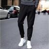 Pantalones deportivos casuales de estilo americano para hombre, elegantes pantalones cortos holgados de talla grande para primavera y verano de 2024