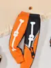 Ropa de dormir de dos piezas para niños, estilo europeo y americano, para primavera y otoño, con estampado de calaveras para Halloween, manga larga y pantalón largo, ropa para niños Ins