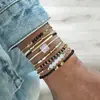 Pulsera de Moda para Mujer Tejida a Mano con Cuentas de Cristal Negro Curvadas y Cuentas de Arroz, Nuevo Set de Múltiples Piezas, Transfronterizo Europeo y Americano