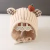 Bonitos y adorables gorros de otoño e invierno para niños, con diseño de poner, material de punto y una serie de dibujos animados, que brindan abrigo y protección para los oídos para bebés y niños pequeños.