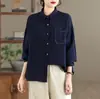 Colección Otoño 2026: Camisa vintage de manga larga, corte holgado, casual, con cuello camisero de solapa, de un solo pecho, con diseño de bolsillo.